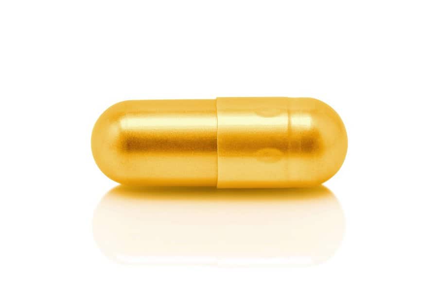 золотая таблеточная капсула